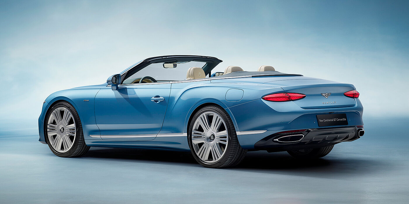 Bentley Lugano New Bentley Continental GTC Azure convertible rear view in Light Windsor blue paint with 22 inch ten spoke wheels and chrome exterior details